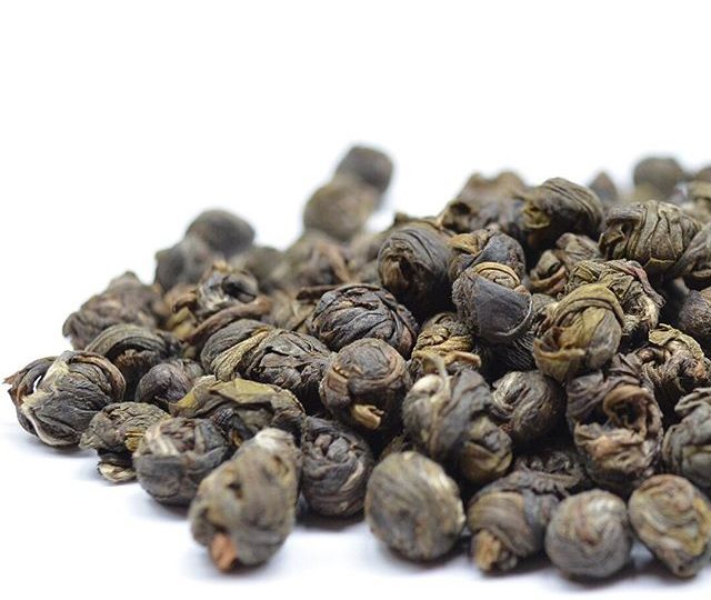 Jasmine Pearls, also known as Buddhas tears are carefully rolled by hand. When hot water is added, the pearls slowly unfurl to release a delicate, smooth and floral green tea experience